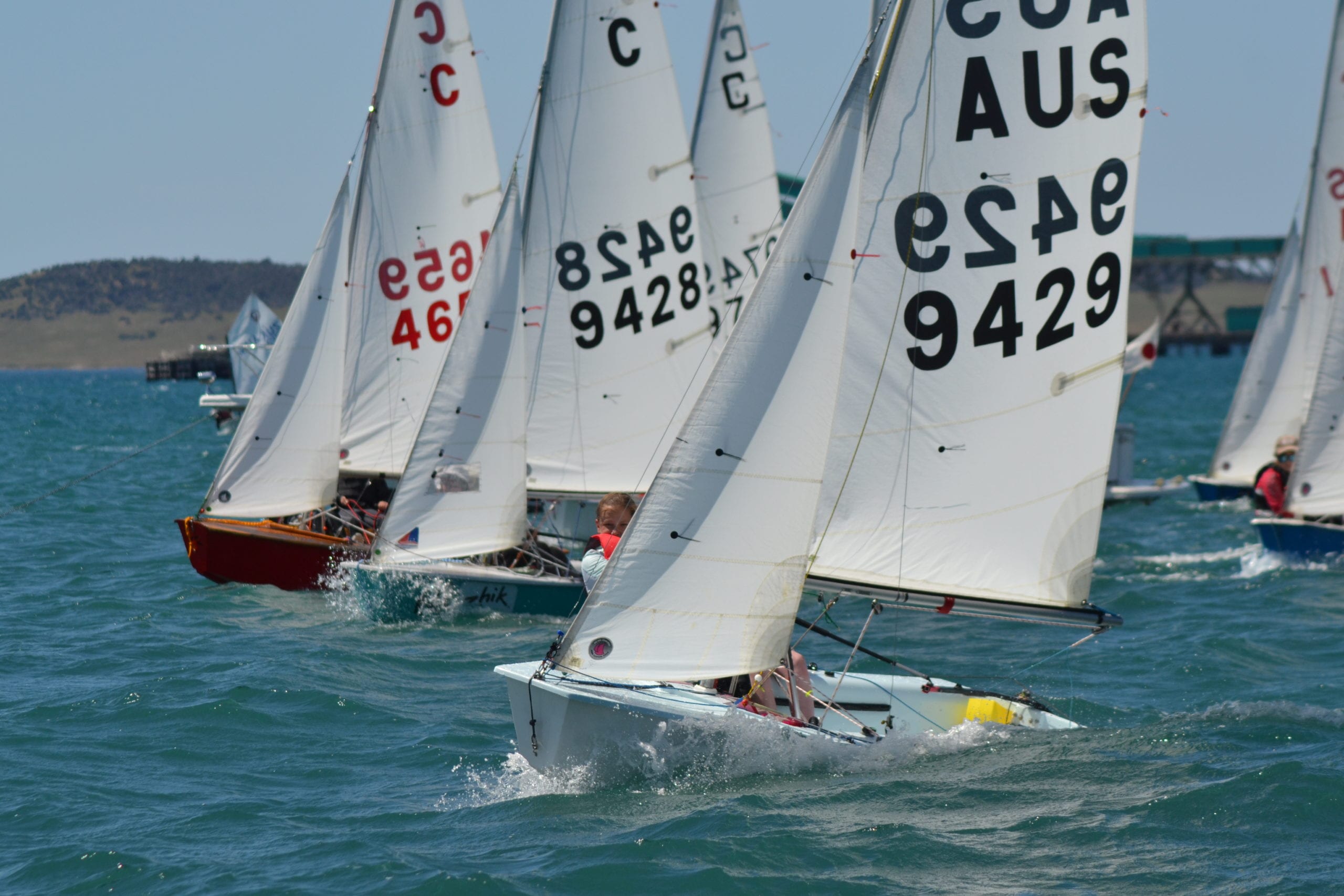 The international cadet fleet off the line of last year's Tri Series event.