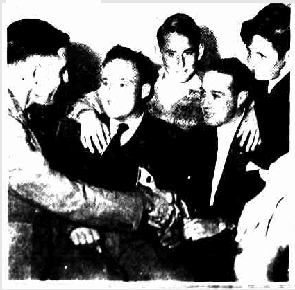 A photo showing Keith Reynolds and Kevin Curry, two of the rescuers, with the rescued man and two boys; a young Alberton man and a boy from Prospect and one from Largs Bay. Photo: The Mail, 18 April 1953
