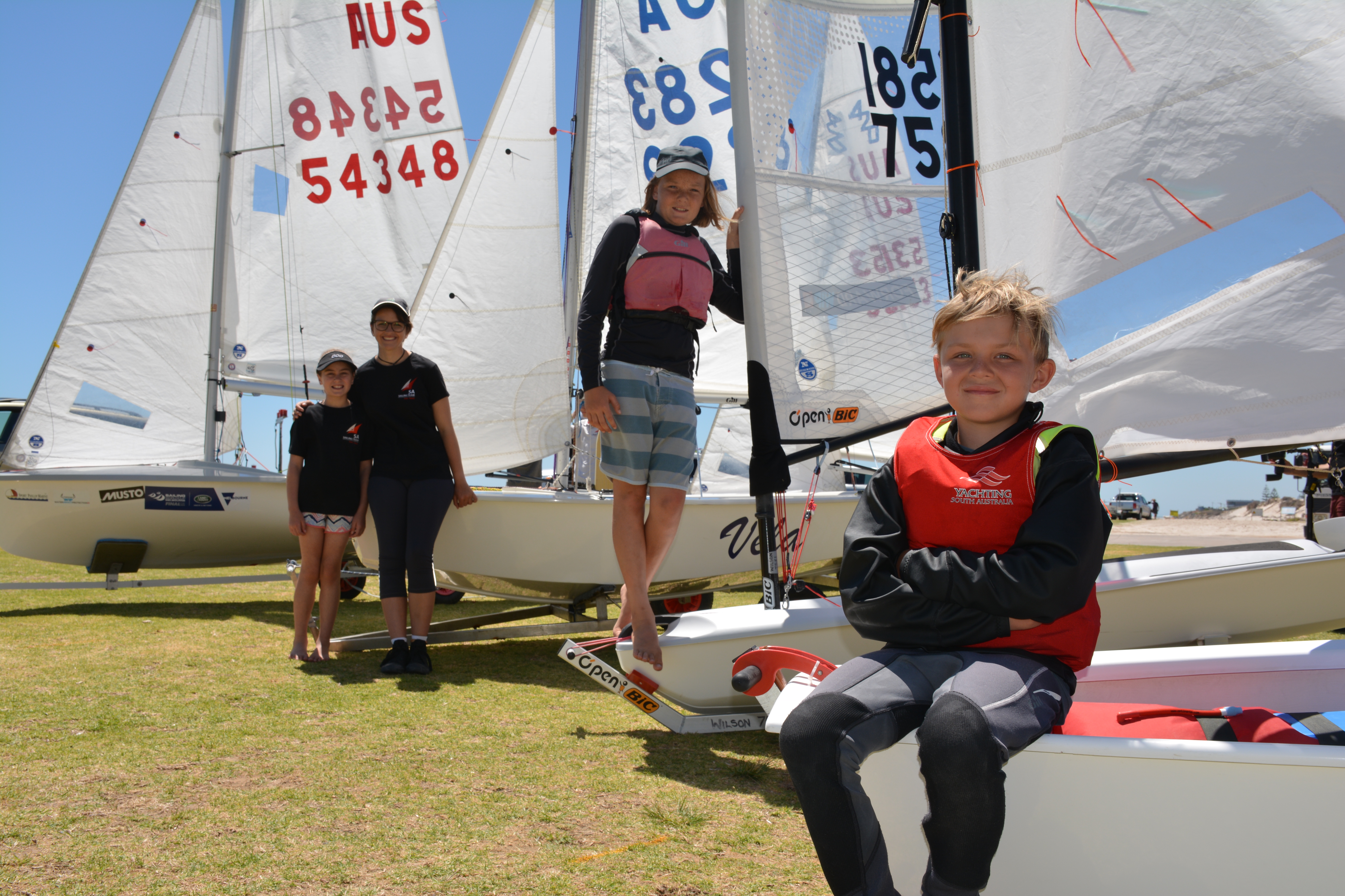 (From left to right) Zoe Hinks, Issy Royle, Harry Mitton and Murphy Cowen are just a handful of the sailors competing in this year's SA Summer of Sail Festival, which will run from Boxing Day through to January 20 on South Australian waters.