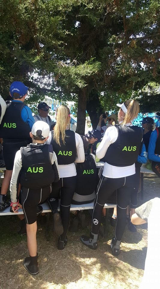 The Australian team getting briefed before a day of racing.