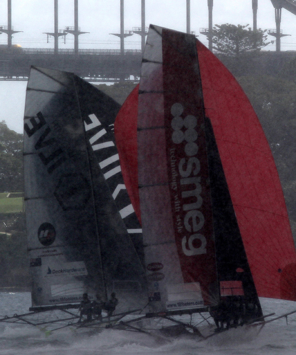 Smeg and Ilve tight spinnaker action in rain squall