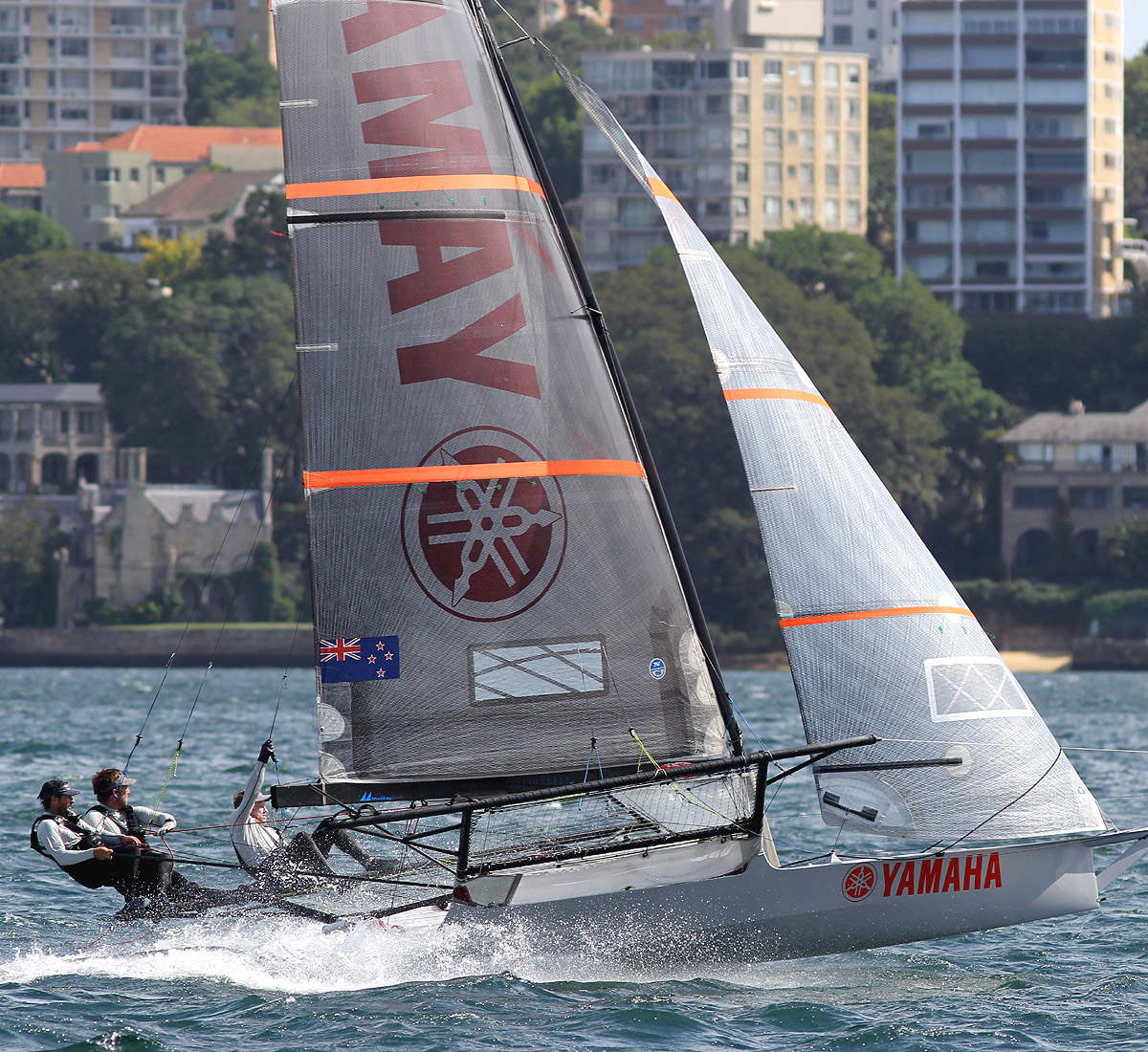 Yamaha's crew drive their skiff on the two-sail reach