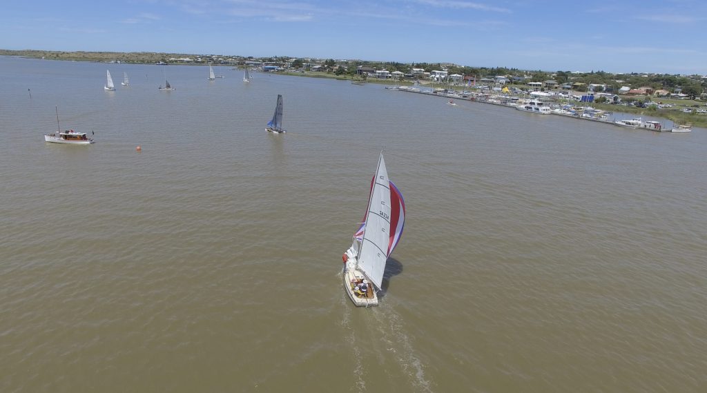 Boats finishing in front of the Goolwa Regatta Yacht Club.
